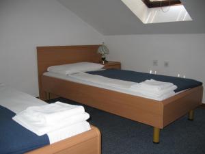 Postel nebo postele na pokoji v ubytování Hotel Veli Jože