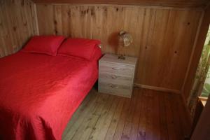 Ένα ή περισσότερα κρεβάτια σε δωμάτιο στο Llaima Camp