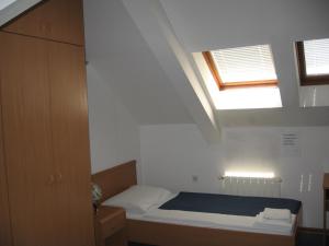 Postel nebo postele na pokoji v ubytování Hotel Veli Jože