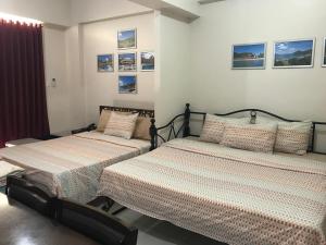 Postel nebo postele na pokoji v ubytování Creys condo at Pico de Loro Cove + 37 fotografií