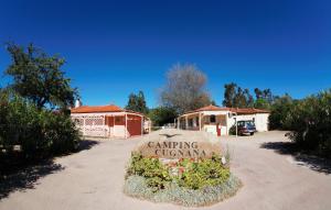 a sign for camping creamery in front of a building at Cugnana Porto Rotondo Bungalows - Camping in Cugnana