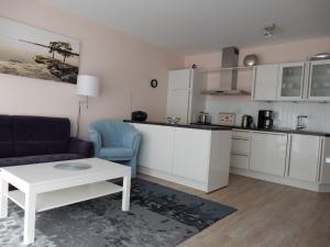 Kuchyň nebo kuchyňský kout v ubytování Ferienwohnung Timmendorfer