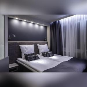 En eller flere senge i et værelse på Hotel Cristal Park