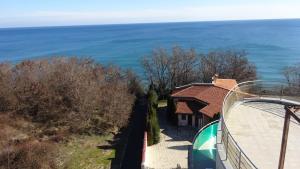 an aerial view of a house with the ocean in the background at Sunny House in Byala