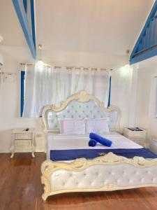 Postelja oz. postelje v sobi nastanitve Siquijor Eastern Garan Seaview Resort