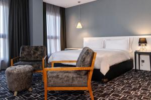 Postel nebo postele na pokoji v ubytování Trademark Hotel, a Member of Design Hotels
