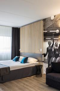 Postel nebo postele na pokoji v ubytování Kalev Spa Hotel & Waterpark