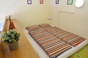 Posteľ alebo postele v izbe v ubytovaní Smile-Inn Budapest