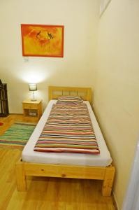 Posteľ alebo postele v izbe v ubytovaní Smile-Inn Budapest