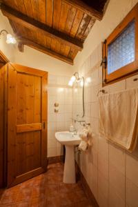 a bathroom with a sink and a mirror at Villa Palaios Agios Athanasios in Palaios Agios Athanasios +31 photos