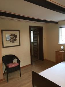 Ένα ή περισσότερα κρεβάτια σε δωμάτιο στο Ferienhaus bei Plön