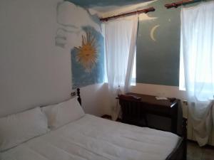 Postel nebo postele na pokoji v ubytování albergo ristorante coppa