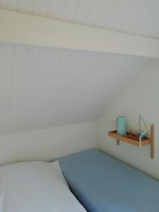 Een bed of bedden in een kamer bij Frejus 134