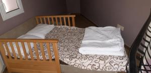 Voodi või voodid majutusasutuse Apartment Danubius toas