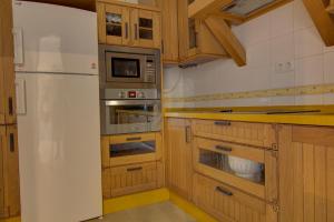 Kuchyň nebo kuchyňský kout v ubytování Apartamentos Centro 1 El Puerto de Santa Maria