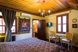 Posteľ alebo postele v izbe v ubytovaní Boutique Hotel Kokkino Spiti