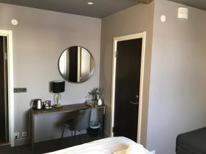 Postel nebo postele na pokoji v ubytování Hotell Gamla Staden