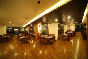 Afbeelding uit fotogalerij van Woodies Bleisure Hotel in Kozhikode +17 foto's