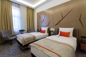 Letto o letti in una camera di Hotel Austria & Bosna