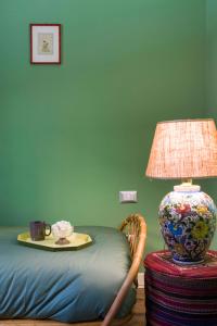 Posteľ alebo postele v izbe v ubytovaní Frími Boutique Rooms b&b