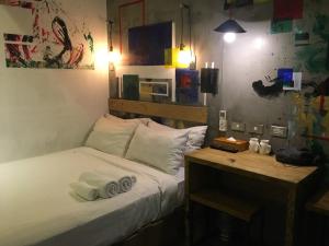 Postel nebo postele na pokoji v ubytování Just Inn 正旅館 台北車站
