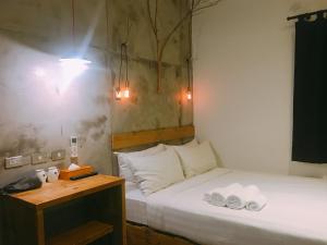 Postel nebo postele na pokoji v ubytování Just Inn 正旅館 台北車站