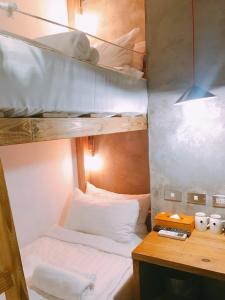 Postel nebo postele na pokoji v ubytování Just Inn 正旅館 台北車站