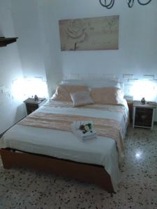 Katil atau katil-katil dalam bilik di vacanza nel salento1