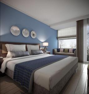 Een bed of bedden in een kamer bij Lara Park Hotel