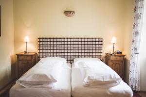 Postel nebo postele na pokoji v ubytování Hotel-Gasthof Weitgasser