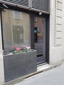 The facade or entrance of Domus Navigli