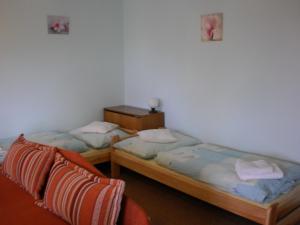 Postel nebo postele na pokoji v ubytování Apartman Kublovi