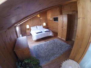 Chamonix Chalets tesisinde bir odada yatak veya yataklar