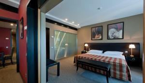 Uma cama ou camas num quarto em Hotel Casino Chaves
