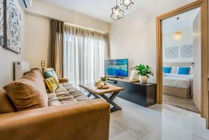 TV a/nebo společenská místnost v ubytování Lemar Luxury Apartments