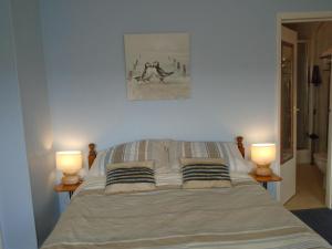 A bed or beds in a room at The Florian 