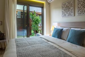 Postel nebo postele na pokoji v ubytování Lemar Luxury Apartments