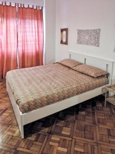 A bed or beds in a room at New Capolinea 5 - Apartment