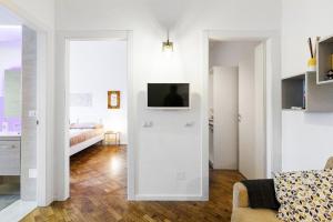 A television and/or entertainment centre at New Capolinea 5 - Apartment