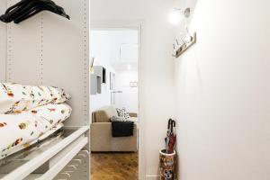 A bed or beds in a room at New Capolinea 5 - Apartment