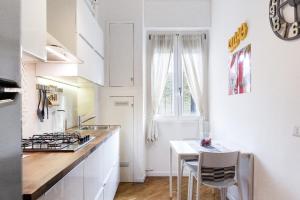 A kitchen or kitchenette at New Capolinea 5 - Apartment