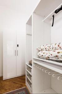A bed or beds in a room at New Capolinea 5 - Apartment