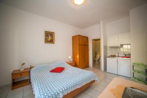Kuchyň nebo kuchyňský kout v ubytování Apartmani Ina
