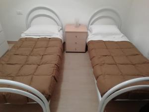 Ένα ή περισσότερα κρεβάτια σε δωμάτιο στο Appartamento San Valentino