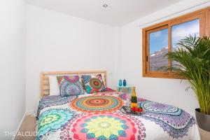 En eller flere senge i et værelse på Apartamento Marina + 46 billeder