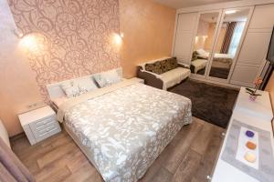 Posteľ alebo postele v izbe v ubytovaní Delicate Lviv Apartment