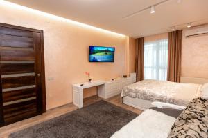 Posteľ alebo postele v izbe v ubytovaní Delicate Lviv Apartment
