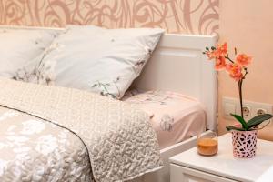 Posteľ alebo postele v izbe v ubytovaní Delicate Lviv Apartment