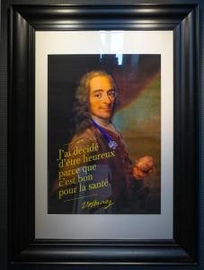 a framed picture of a painting of a man at Hotel Voltaire Opera Nantes Centre in Nantes