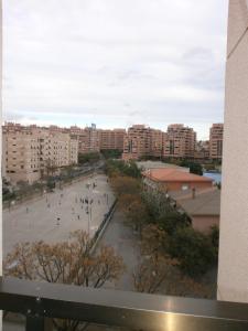 a view of a city with buildings and a street at Rooms in Apartment Gran Via with Pool in Alicante